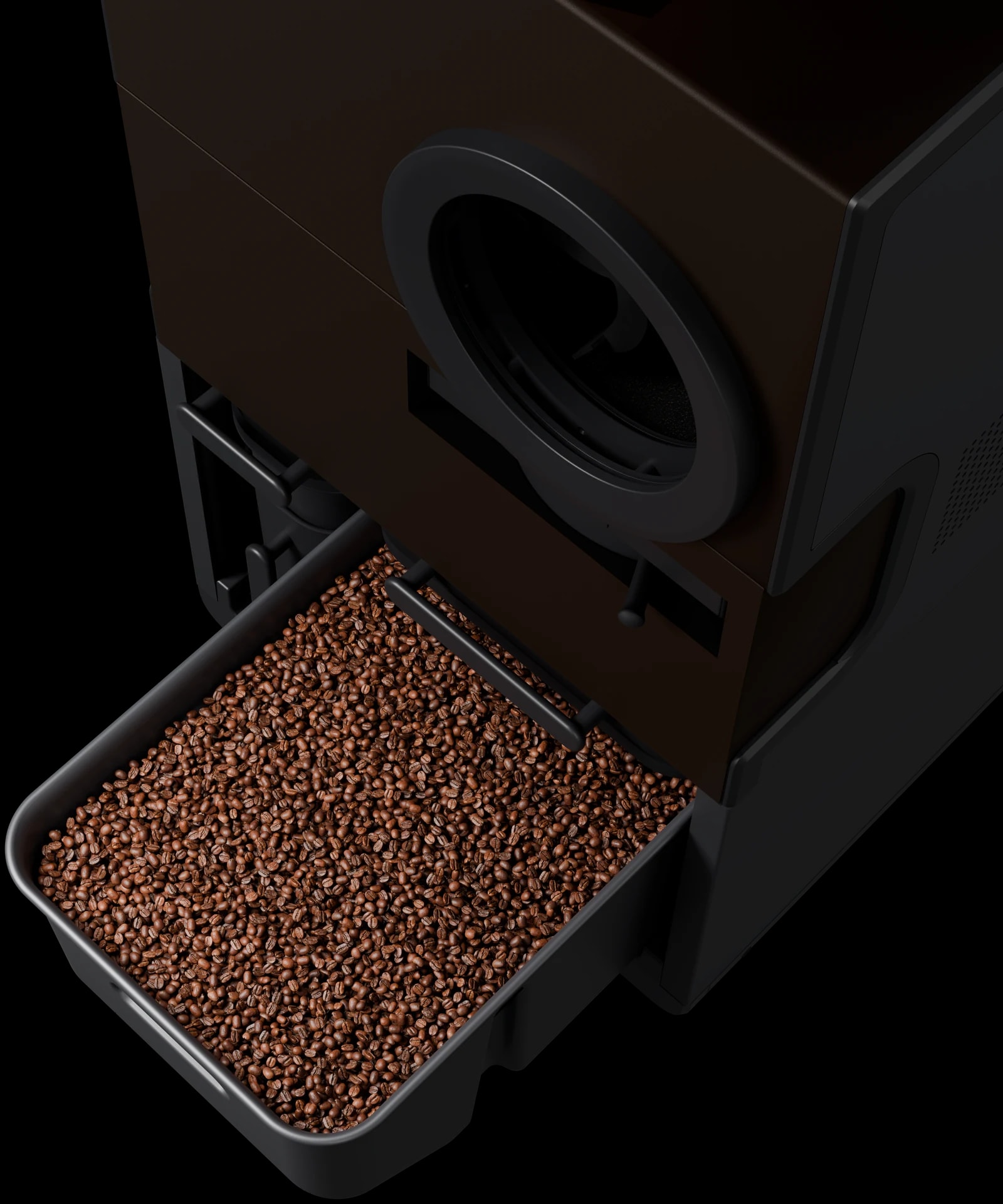 Roasted coffee collecting below the drum
