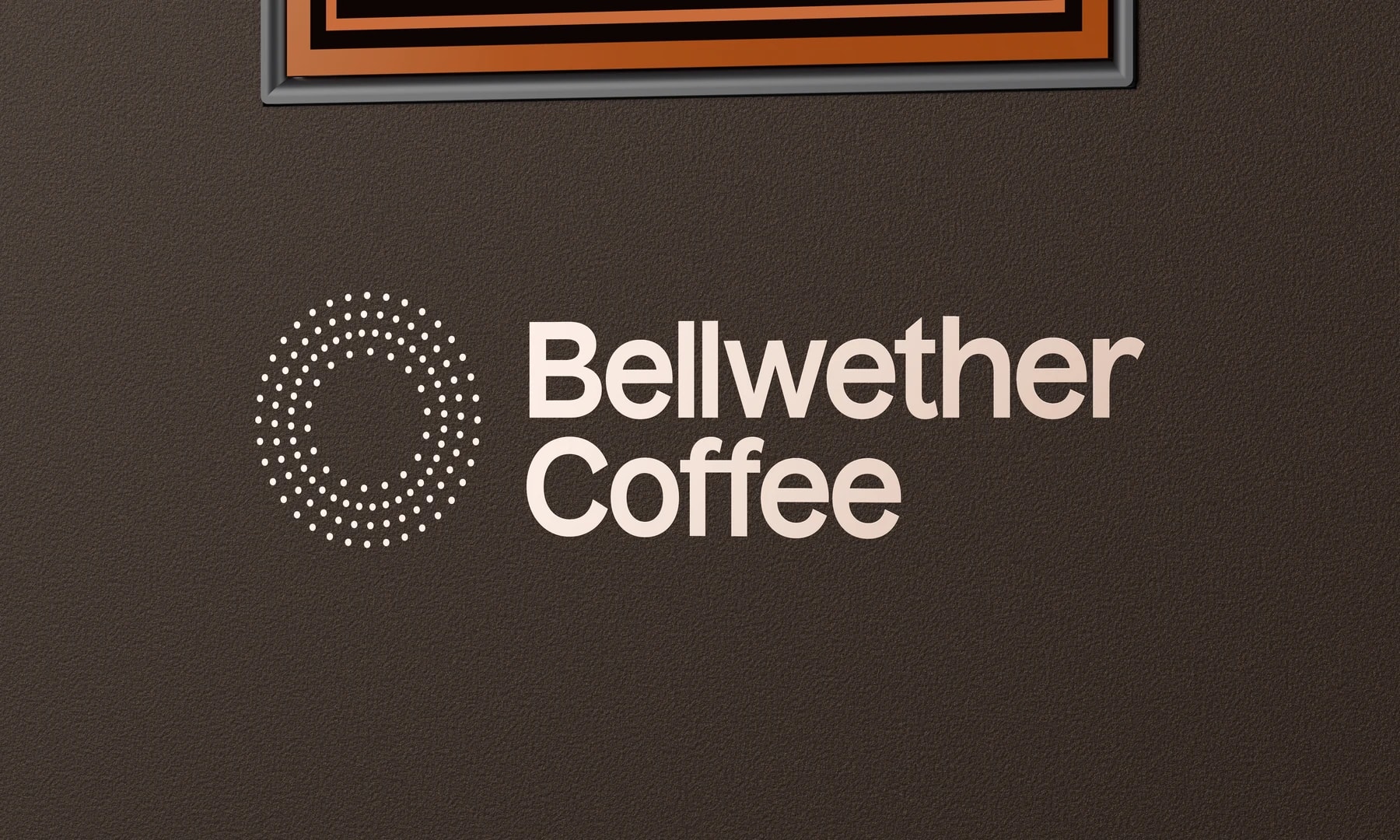 Raking light across the Deep Bronze powder-coat finish and the Bellwether logo