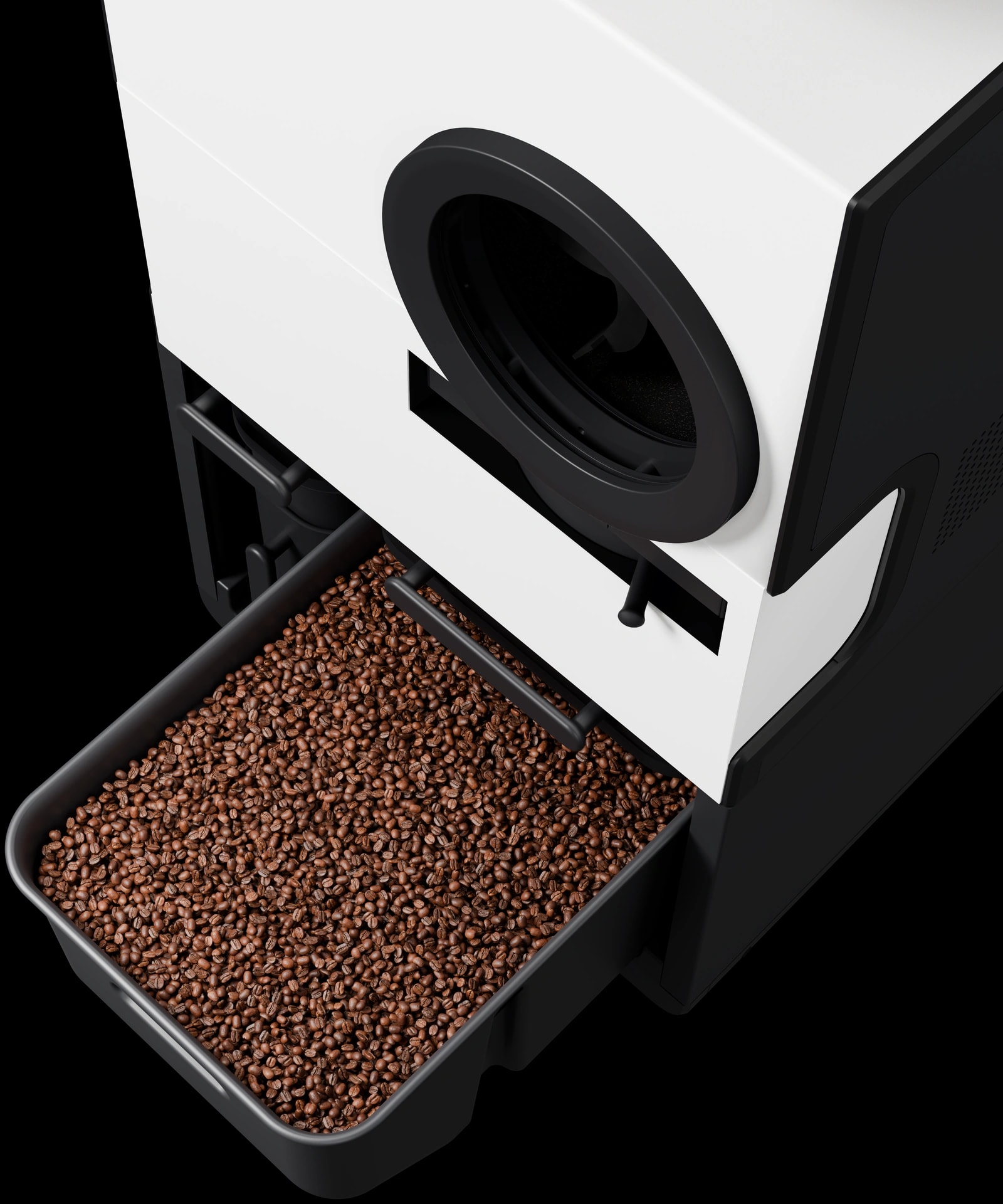 Roasted coffee collecting below the Classic White Shop Roaster with continuous roasting